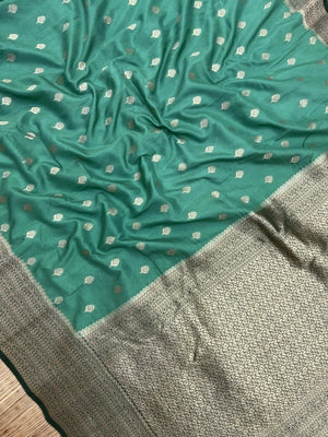 A beautifully draped Semi Banarasi Georgette Saree featuring intricate patterns and delicate weaving. The saree’s lightweight and breathable fabric ensures comfort, making it an ideal choice for daily wear. Perfectly blending traditional design with modern elegance, this saree is suitable for casual and formal occasions.