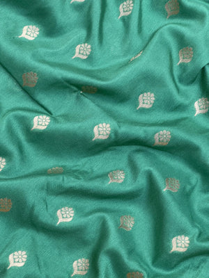 A beautifully draped Semi Banarasi Georgette Saree featuring intricate patterns and delicate weaving. The saree’s lightweight and breathable fabric ensures comfort, making it an ideal choice for daily wear. Perfectly blending traditional design with modern elegance, this saree is suitable for casual and formal occasions.