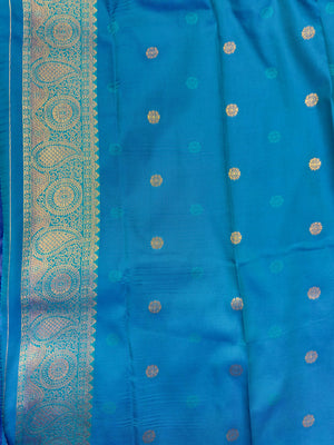 Semi Kanjivaram silk saree with rich zari border and traditional South Indian motifs – ideal for festive and wedding wear