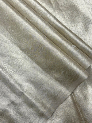 Semi Kanjivaram silk saree with zari border and traditional motifs – ideal for weddings and festive wear