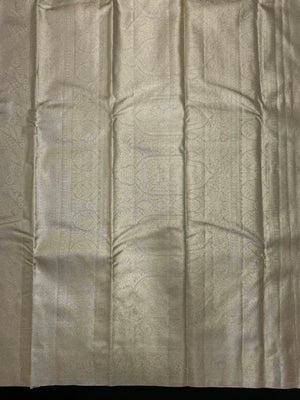 Semi Kanjivaram silk saree with zari border and traditional motifs – ideal for weddings and festive wear