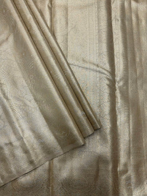 Semi Kanjivaram silk saree with zari border and traditional motifs – ideal for weddings and festive wear