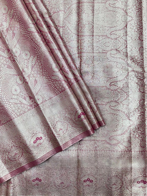 Semi Kanjivaram silk saree with zari border and traditional motifs – ideal for weddings and festive wear