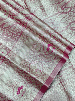Semi Kanjivaram silk saree with zari border and traditional motifs – ideal for weddings and festive wear
