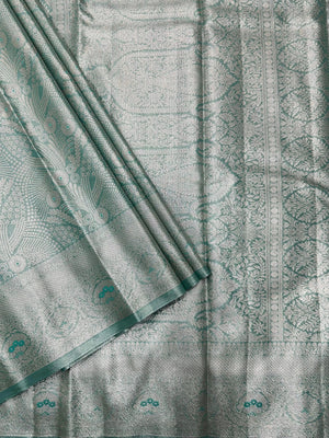 Semi Kanjivaram silk saree with zari border and traditional motifs – ideal for weddings and festive wear