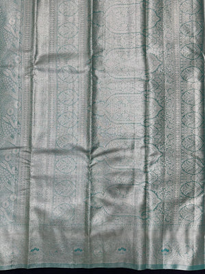 Semi Kanjivaram silk saree with zari border and traditional motifs – ideal for weddings and festive wear