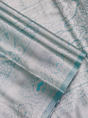 Semi Kanjivaram silk saree with zari border and traditional motifs – ideal for weddings and festive wear