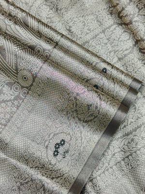 Semi Kanjivaram silk saree with zari border and traditional motifs – ideal for weddings and festive wear