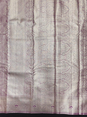 Semi Kanjivaram silk saree with zari border and traditional motifs – ideal for weddings and festive wear