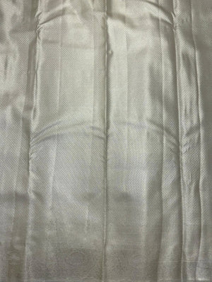 Semi Kanjivaram silk saree with zari border and traditional motifs – ideal for weddings and festive wear