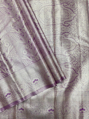 Semi Kanjivaram silk saree with zari border and traditional motifs – ideal for weddings and festive wear