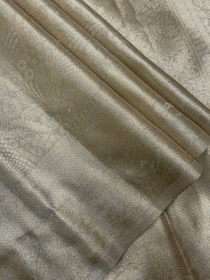 Semi Kanjivaram silk saree with zari border and traditional motifs – ideal for weddings and festive wear