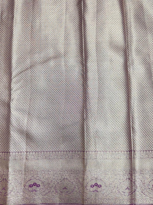 Semi Kanjivaram silk saree with zari border and traditional motifs – ideal for weddings and festive wear