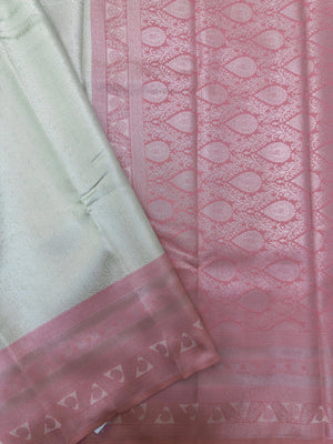 "Luxury Semi Silk Kanjivaram Saree with Intricate Weave and Zari Work, Perfect for Weddings, Festivals, and Parties, Showcasing Timeless Elegance."