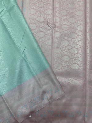 "Luxury Semi Silk Kanjivaram Saree with Intricate Weave and Zari Work, Perfect for Weddings, Festivals, and Parties, Showcasing Timeless Elegance."