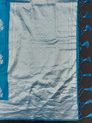 Woman draped in a Semi Silk Saree with soft shine and flowy texture – ideal for daily wear and small festive events.