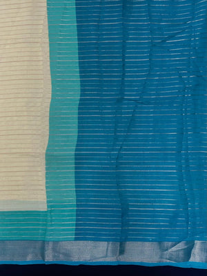 Woman wearing a Semi Silk Saree with elegant shine and festive border – perfect for ethnic functions and special occasions.