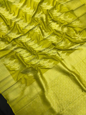 Woman wearing a Semi Silk Saree with smooth, shiny finish and lightweight fabric, ideal for festive and everyday occasions.