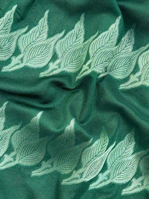 Woman wearing a Semi Silk Saree with smooth, shiny finish and lightweight fabric, ideal for festive and everyday occasions.