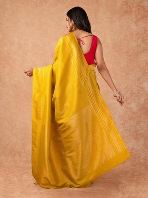 Woman wearing a Semi Silk Saree with lightweight drape and subtle shine, ideal for office wear, family gatherings, and festive occasions.