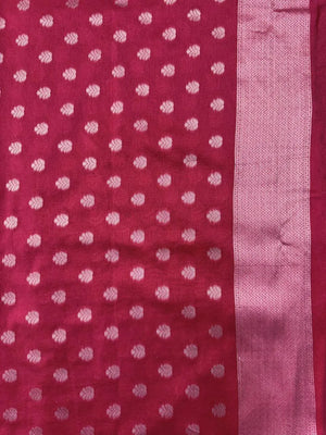 Woman wearing a Semi Silk Saree with smooth, shiny finish and lightweight fabric, ideal for festive and everyday occasions.