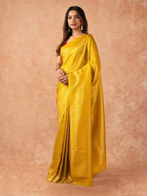 Woman wearing a Semi Silk Saree with lightweight drape and subtle shine, ideal for office wear, family gatherings, and festive occasions.