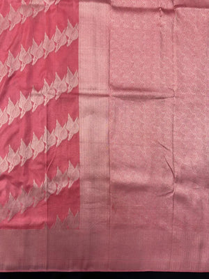 Woman wearing a Semi Silk Saree with smooth, shiny finish and lightweight fabric, ideal for festive and everyday occasions.