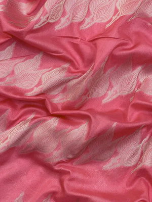 Woman wearing a Semi Silk Saree with smooth, shiny finish and lightweight fabric, ideal for festive and everyday occasions.