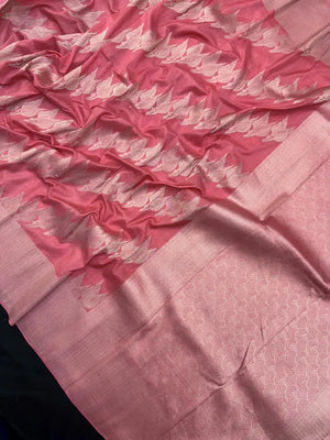 Woman wearing a Semi Silk Saree with smooth, shiny finish and lightweight fabric, ideal for festive and everyday occasions.