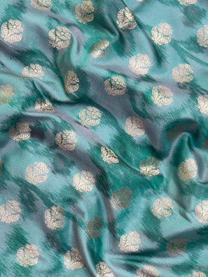 Woman wearing a Semi Silk Saree with lightweight fabric and soft sheen, ideal for weddings, festive occasions, and office wear.