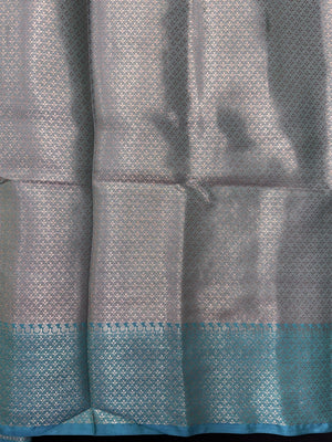 Woman wearing a Semi Silk Saree with lightweight fabric and soft sheen, ideal for weddings, festive occasions, and office wear.