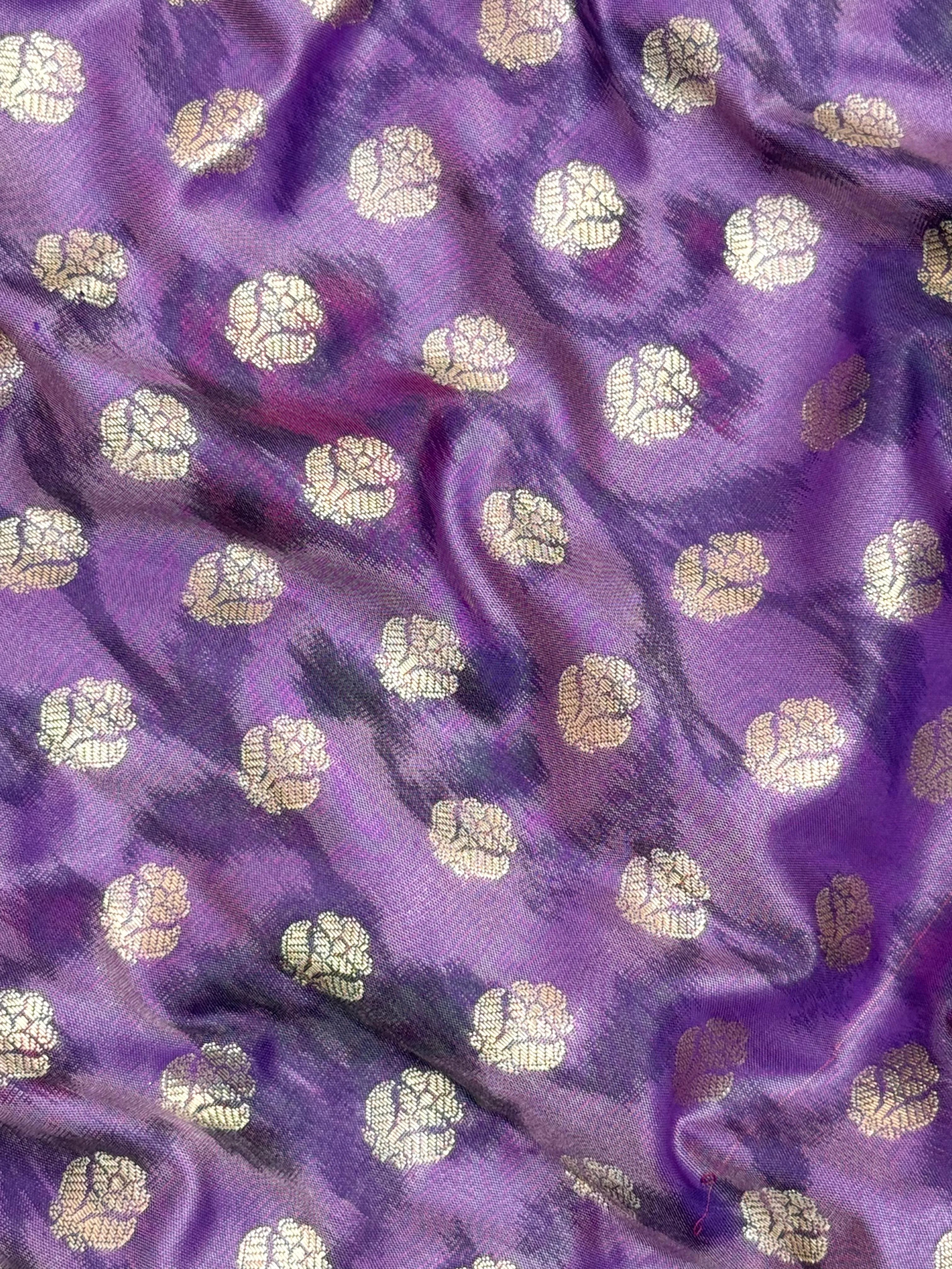 Woman wearing a Semi Silk Saree with lightweight fabric and soft sheen, ideal for weddings, festive occasions, and office wear.