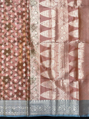 Woman wearing a Semi Silk Saree with lightweight fabric and soft sheen, ideal for weddings, festive occasions, and office wear.