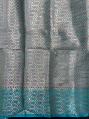 Woman wearing a Semi Silk Saree with lightweight fabric and soft sheen, ideal for weddings, festive occasions, and office wear.