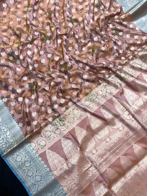 Woman wearing a Semi Silk Saree with lightweight fabric and soft sheen, ideal for weddings, festive occasions, and office wear.