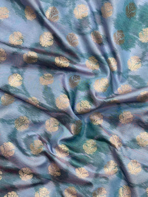 Woman wearing a Semi Silk Saree with lightweight fabric and soft sheen, ideal for weddings, festive occasions, and office wear.