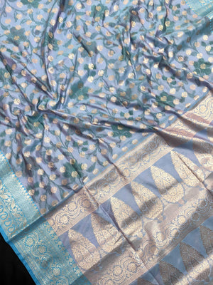 Woman wearing a Semi Silk Saree with lightweight fabric and soft sheen, ideal for weddings, festive occasions, and office wear.