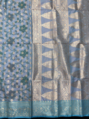 Woman wearing a Semi Silk Saree with lightweight fabric and soft sheen, ideal for weddings, festive occasions, and office wear.