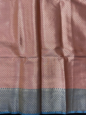 Woman wearing a Semi Silk Saree with lightweight fabric and soft sheen, ideal for weddings, festive occasions, and office wear.