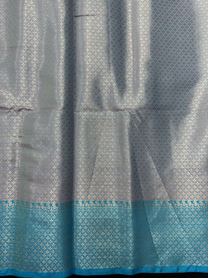 Woman wearing a Semi Silk Saree with lightweight fabric and soft sheen, ideal for weddings, festive occasions, and office wear.