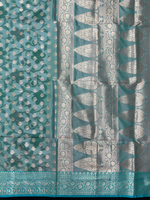 Woman wearing a Semi Silk Saree with lightweight fabric and soft sheen, ideal for weddings, festive occasions, and office wear.