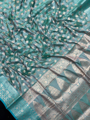 Woman wearing a Semi Silk Saree with lightweight fabric and soft sheen, ideal for weddings, festive occasions, and office wear.