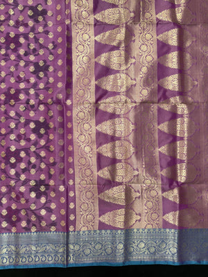 Woman wearing a Semi Silk Saree with lightweight fabric and soft sheen, ideal for weddings, festive occasions, and office wear.