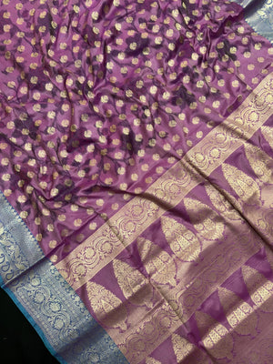 Woman wearing a Semi Silk Saree with lightweight fabric and soft sheen, ideal for weddings, festive occasions, and office wear.