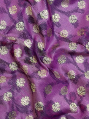 Woman wearing a Semi Silk Saree with lightweight fabric and soft sheen, ideal for weddings, festive occasions, and office wear.