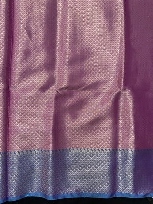 Woman wearing a Semi Silk Saree with lightweight fabric and soft sheen, ideal for weddings, festive occasions, and office wear.