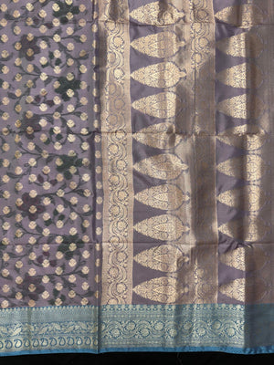 Woman wearing a Semi Silk Saree with lightweight fabric and soft sheen, ideal for weddings, festive occasions, and office wear.