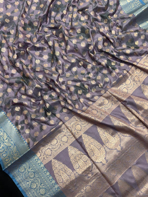 Woman wearing a Semi Silk Saree with lightweight fabric and soft sheen, ideal for weddings, festive occasions, and office wear.