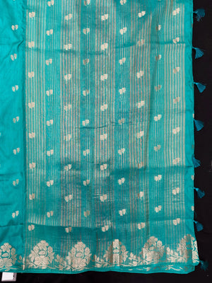 Woman wearing a Semi Silk Saree with lightweight drape and subtle shine, perfect for office, family gatherings, and festive occasions.