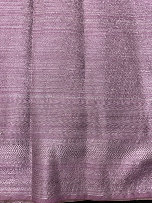 Woman wearing a Semi Silk Saree with a soft shine and lightweight drape, ideal for everyday elegance and traditional style.